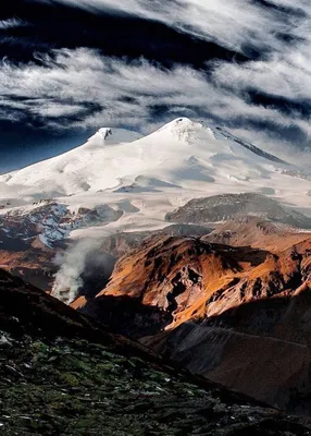 Mount Elbrus in the Caucasus Mountains in Southern Russia, near the border  with Georgia. | Nature tourism, Fall photography nature, Mountains