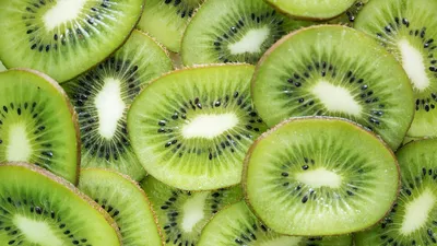 Kiwi fruit, slice of qiwi isolated on white background. Cut of green sweet  kiwi. Kiwi healthy food. Stock Photo | Adobe Stock