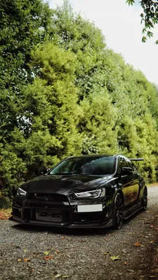 Скачать 938x1668 mitsubishi lancer evolution, mitsubishi, черный, вид  спереди обои, картинки iphone 8/7/6s/6 for parallax