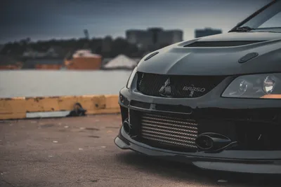 Скачать 1920x1080 mitsubishi lancer evolution, mitsubishi, черный, вид  спереди обои, картинки full hd, hdtv, fhd, 1080p