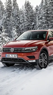 Photos Volkswagen Tiguan Orange Snow automobile 1080x1920