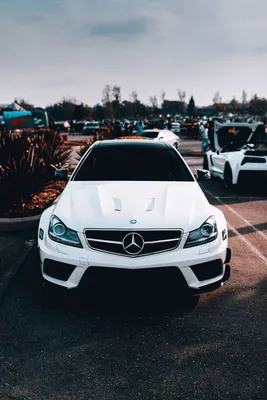 Download wallpaper 540x960 white, mercedes-benz, rear view, mercedes,  cls63, amg samsung galaxy s4 mini, microsoft lumia 535, philips xenium, lg  l90, htc sensation hd background