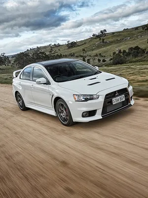 Pictures Mitsubishi Evolution Evo X Lancer White driving 600x800