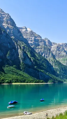 Switzerland, lake, mountains, people 1080x1920 iPhone 8/7/6/6S Plus  wallpaper, background, picture, image