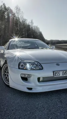 right side of toyota supra mk4 illustration | Wallpapers.ai